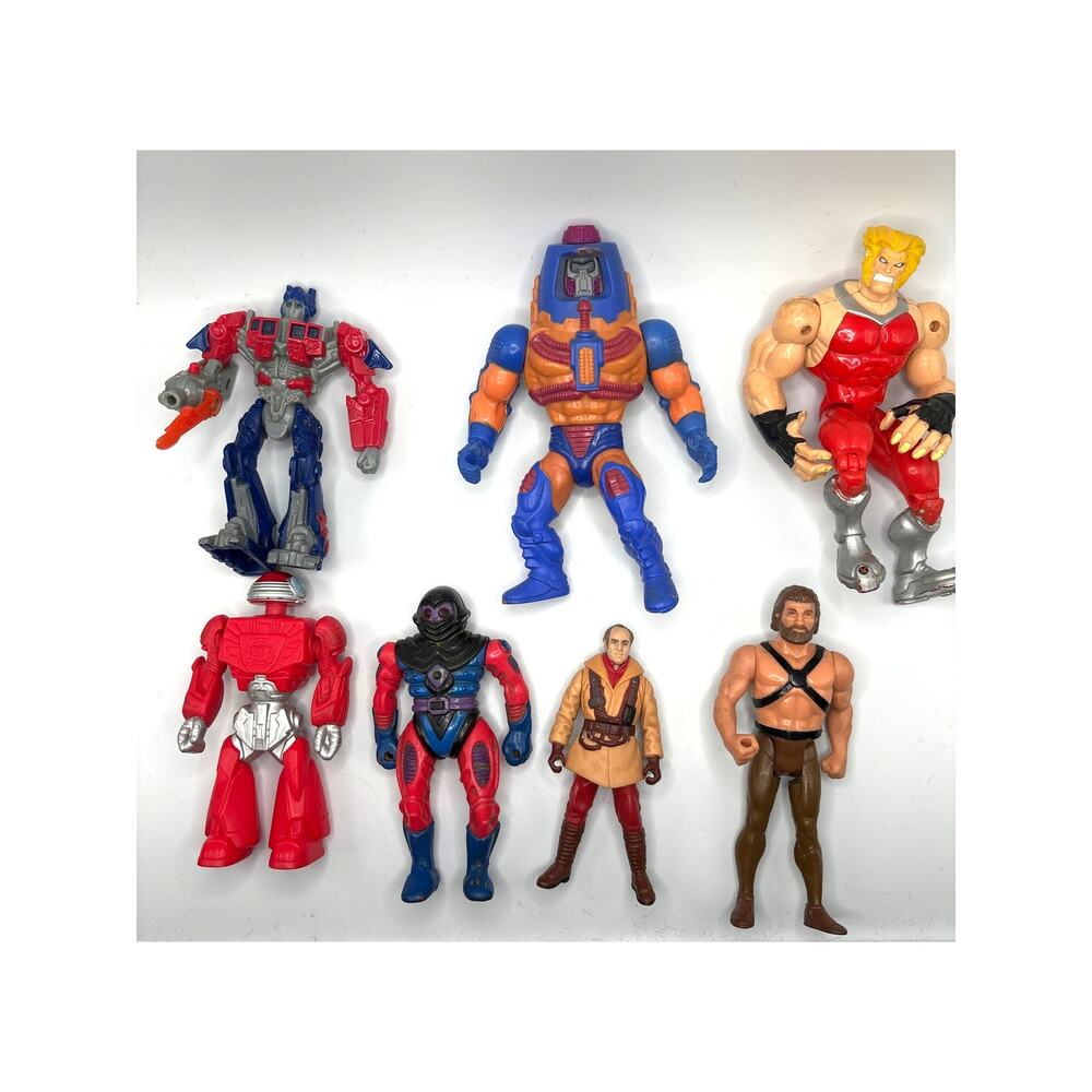 Assorted Vintage Action Figures Lot of 7 Transformers/Star Wars/He-man and More